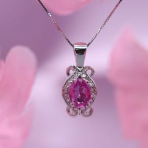 silver necklace with pink sapphire pendant
